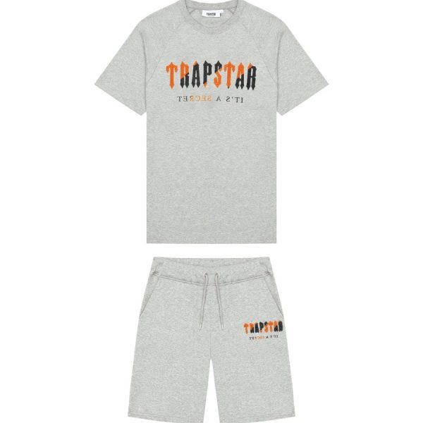 the Trapstar Chenille Decoded Shorts Set. This exclusive ensemble pairs comfort with style, presenting a matching hoodie and shorts meticulously crafted from premium materials